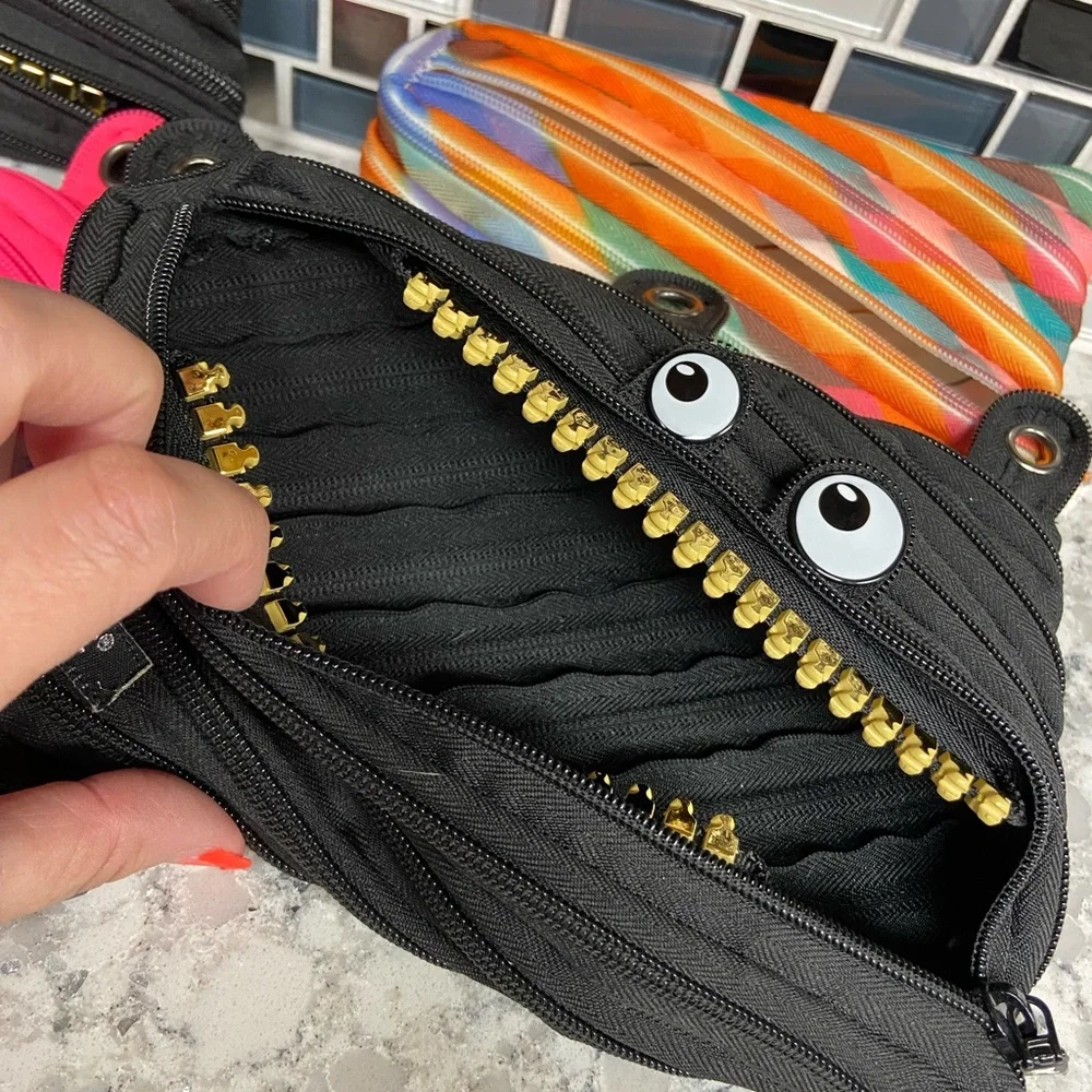 NWT Monster Grillz Pencil Case Set - 1 Pink, 2 Black and Orange multi color.